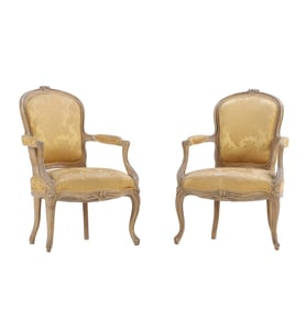 PAIR FLORAL CARVED AND PAINTED FRENCH LOUIS XV STYLE OPEN ARM CHAIRS C 1900.