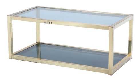 A MID CENTURY MODERN BRASS AND GLASS COFFEE TABLE.