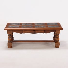 FRENCH OAK AND SLATE COFFEE TABLE WITH A SINGLE DRAWER.