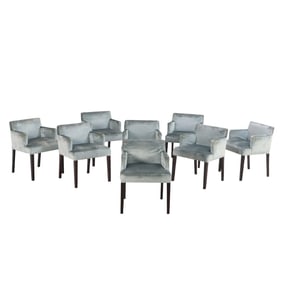 EIGHT FRENCH MODERN DINING CHAIRS WITH ARMS UPHOLSTERED IN A VELVET LIKE MATERIAL.
