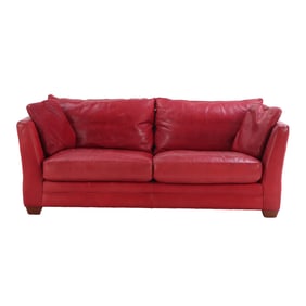 MODERN RED LEATHER SOFA WITH LOOSE CUSHION UPHOLSTERY.