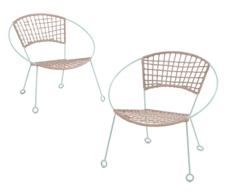 PAIR PAINTED IRON LOUNGE CHAIRS WITH ROPE SEATS AND BACKS AND LOOP FORM DETAILS.