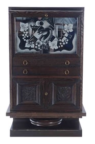 A QUALITY DARK CERUSED OAK BAR CABINET ATTRIBUTED TO CHARLES DUDOUYT C 1940.