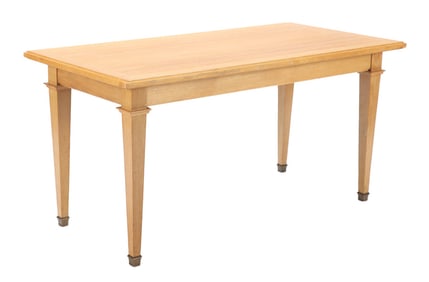 FRENCH OAK LIBRARY TABLE IN THE MANNER OF JACQUES ADNET.