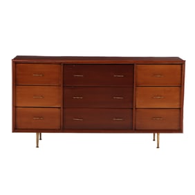 MAHOGANY NINE DRAWER DRESSER C 1960 RESTING ON BRONZE LEGS.