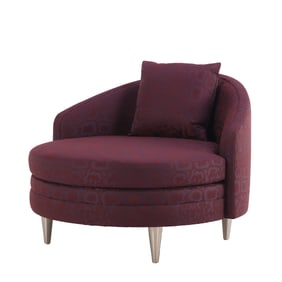 A SINGLE OVERSIZED ROUND MODERN CHAIR WITH METAL FEET.