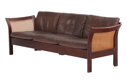 LEATHER, WOOD AND CANE SOFA HAVING LOOSE CUSHIONS C 1980.