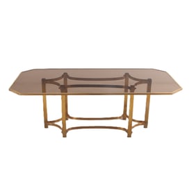 ITALIAN BRASS AND SMOKED GLASS DINING TABLE HAVING A PINCHED RACE TRACK STRETCHER C 1970.