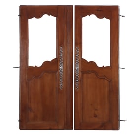 PAIR FRENCH CHERRY CABINET DOORS HAVING GLASS INSERTS AND STEEL HARDWARE C 1840.