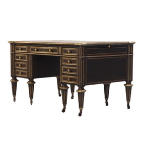 MAHOGANY LOUIS XVI STYLE LEATHER TOP DESK C 1910 HAVING BRASS TRIM THROUGHOUT.