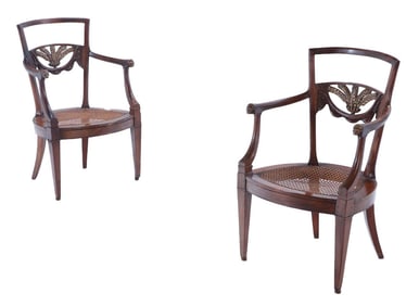 PAIR WALNUT DIRECTOIRE CARVED AND GILT OPEN ARM CHAIRS WITH PLUME CARVED BACK AND CANE SEATS C1820