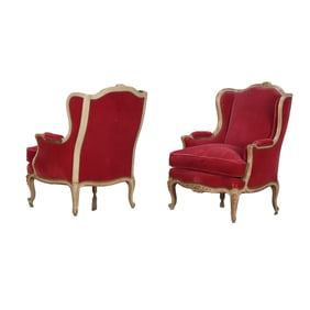 PAIR PAINTED AND GILTWOOD LOUIS XV STYLE FRENCH BERGERE CHAIRS UPHOLSTERED IN RED VELVET C 1920.