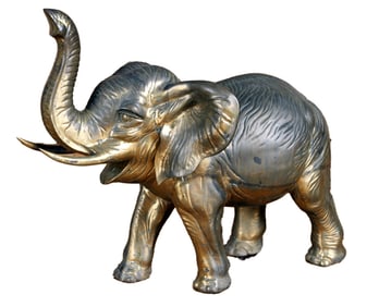A BRASS ELEPHANT WITH RAISED TRUNK