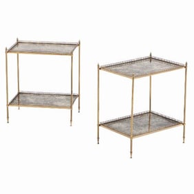 A beautiful pair of French brass and mirrored tables in the manner of Jansen C 1945.
