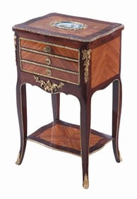 A French Louis XV style kingwood and rosewood cabinet C 1900.