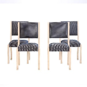 A set of four French side chairs in the manner of Marc Du Plantier circa 1990.