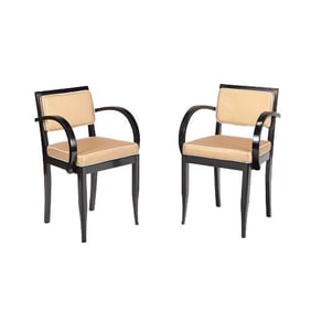 A pair of Italian Art Deco ebonized open armchairs C 1940.