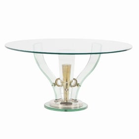 An Italian nickeled metal and glass coffee table attributed to Fontana Arte C 1945.