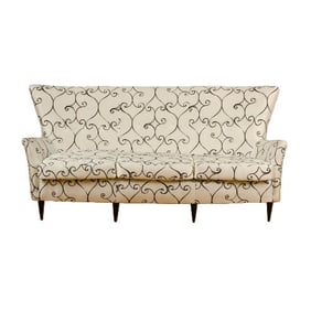 An elegant and graceful Italian sofa attributed to Paolo Buffa C 1950 .
