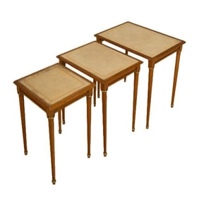 A set of three mahogany nesting tables attributed to Comte C 1940.