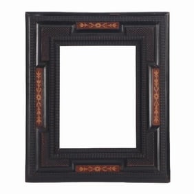 A Dutch partial ebonized and inlaid picture frame or mirror frame C 1850 .