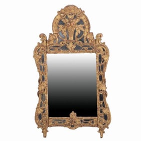 A French Regence carved giltwood mirror 18th C.