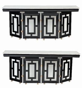 A pair of MCM ebonized marble top console tables in the style of Parzinger C 1950.