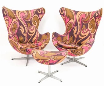 A rare pair of Arne Jacobsen for Fritz Hansen Egg chairs and matching ottoman c 1973.