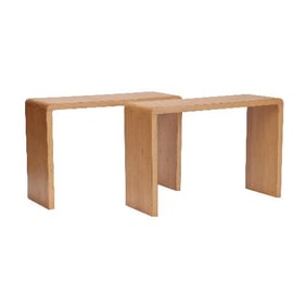 A pair of cerused oak waterfall console tables .