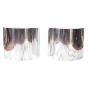 A pair of MCM chrome demi lune console tables circa 1970.
