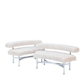 A pair of Modern curved chrome benches or small sofas circa 1970.