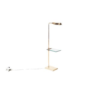 A brass and glass adjustable floor lamp C 1970.