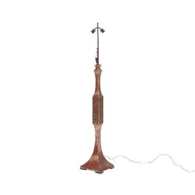 An unusual carved and gilt wood floor lamp C 1950.