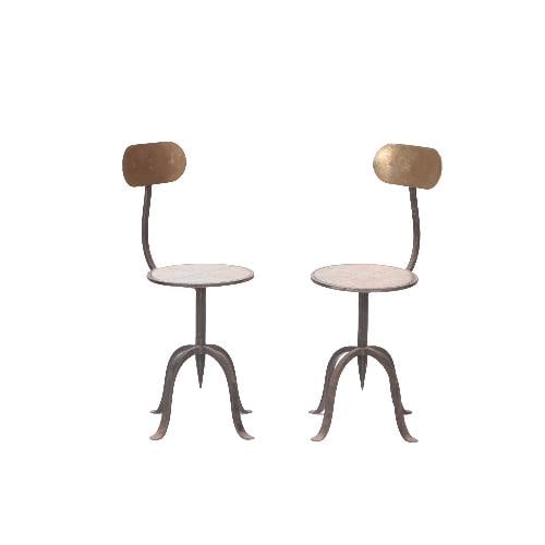 A pair of vintage mixed metal side chairs / stools C 1970.: A pair of vintage mixed metal side chairs / stools C 1970. The industrial feel is present with small oval backs, round seats, and quadrapod bases with simple flat legs. All in a variety of metal. Ht: