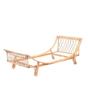 An Italian vintage rattan daybed circa 1960.