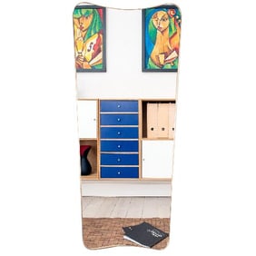 An Italian long brass mirror in the manner of Gio Ponti .
