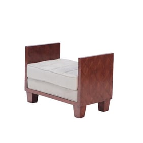 A straw marquetry upholstered bench in the manner of Jean-Michel Frank .