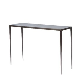 A wrought iron console table in the manner of Jean-Michel Frank .