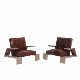 An imposing pair of Modernist cerused oak armchairs in the manner of Jean-Michel Frank.