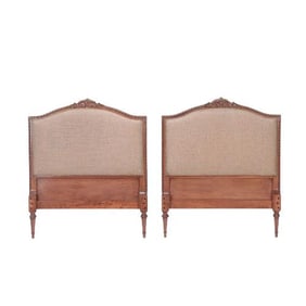 A pair of French Louis XVI style twin bed headboards C 1950.