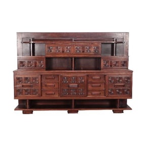 A French Modernist oak three-piece cabinet in the manner of Charles Dudouyt C 1940.