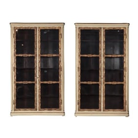 A stately pair of French parcel gilt bookcases 19th C.