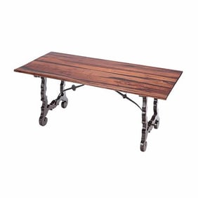 A Brazilian table with iron stretcher C 1940.
