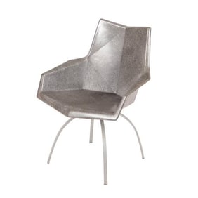 A Paul McCobb faceted Origami chair on spider base circa 1960.