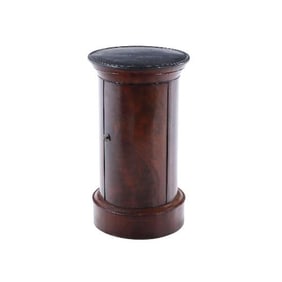 A French crotch mahogany marble top cylindrical cabinet C 1840.