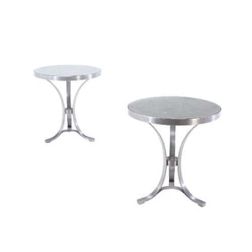 A French pair of steel and lacquered wood round tables attributed to Maison Jansen (Paris) C 1970.