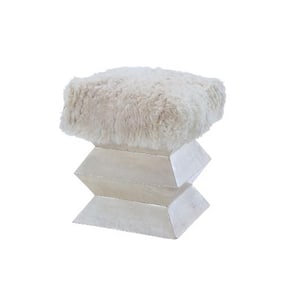 A parchment covered stool of architectural form .