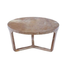 Small round parchment covered coffee table .