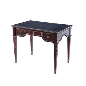 A French Louis XVI style three drawer mahogany bureau plat desk C 1930.