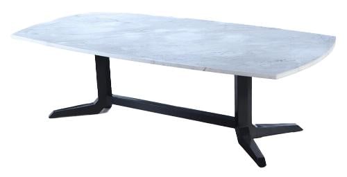 An ebonized marble top dining table C 1960.